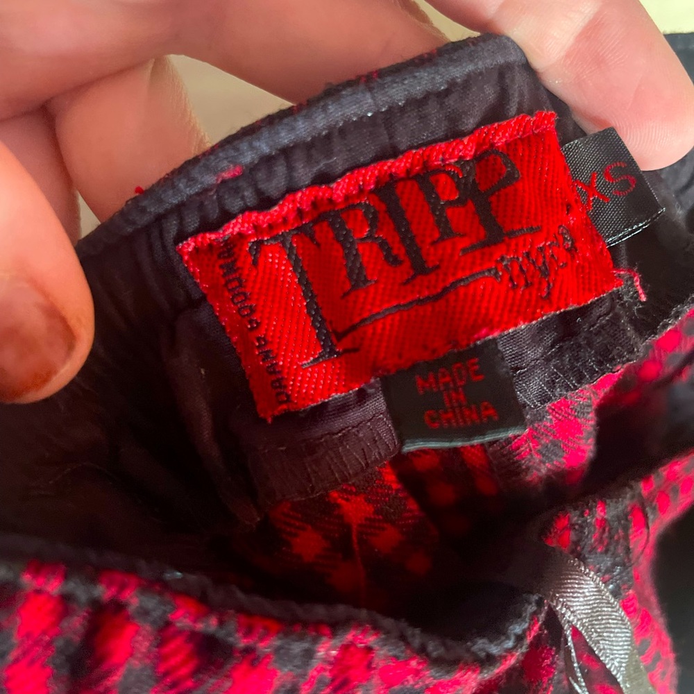Tripp NYC Corset, red checkered pattern, Size Xs, one different button.